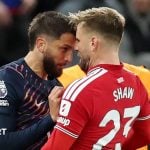 Tottenham's Rodrigo Bentancur and Manchester United's Luke Shaw go head-to-head