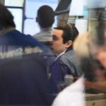 Asian shares mostly rise amid market optimism about AI, despite Iran worries